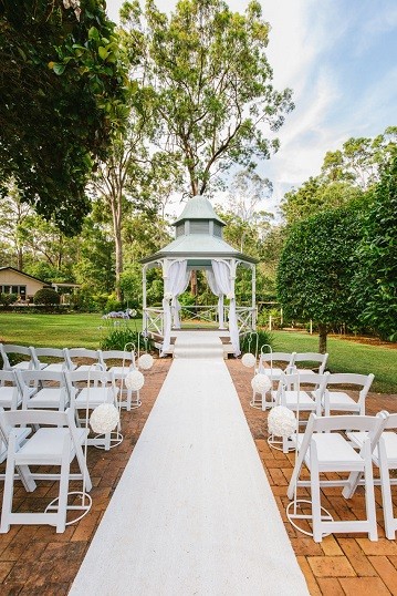 Aisle and white chairs set up facing the rotunda